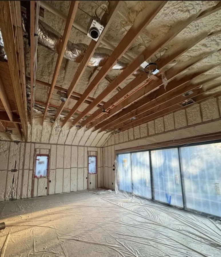 Interior walls and ceiling insulated with spray foam during new construction in Columbus